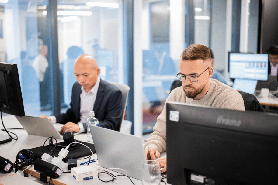 bluesource_employees_at_their_desks-1