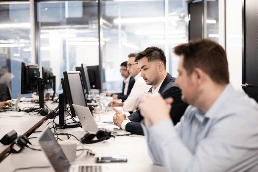bluesource_employees_at_their_desks-2