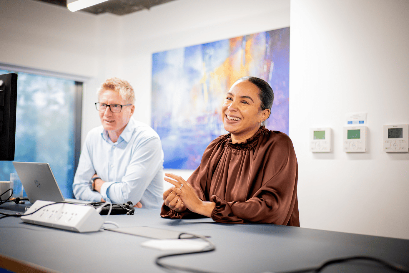 bluesource_team_on_their_desks